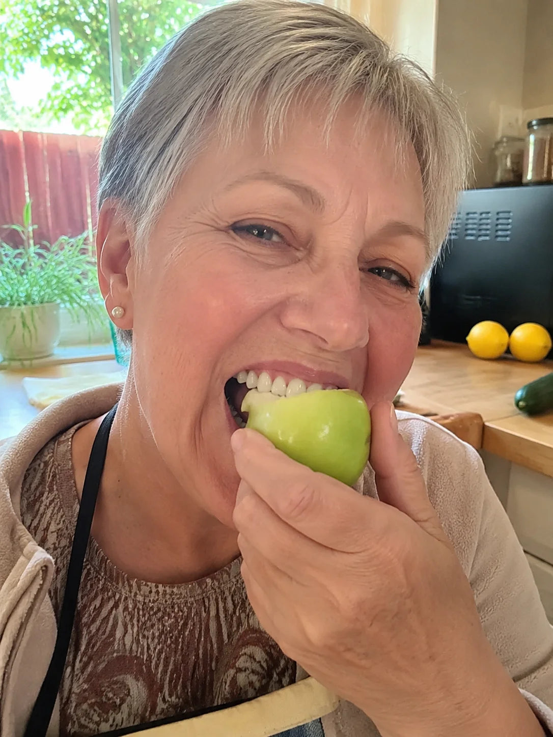 Customer enjoying an apple